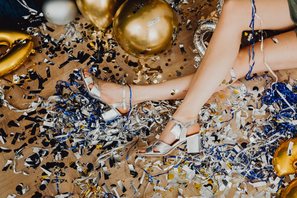 A woman's legs and new years confetti